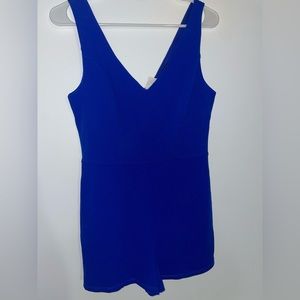 Women's Blue Crystal Sky size medium sleeveless romper. Stretchy with pockets